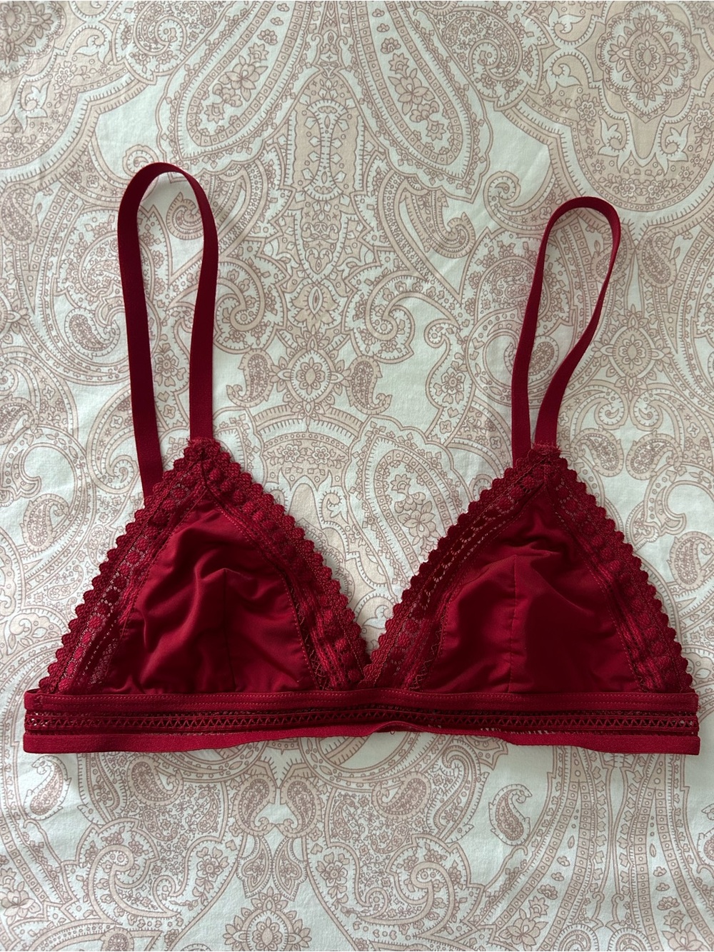 Dark red triangle bralette with crochet lace embroidery detail